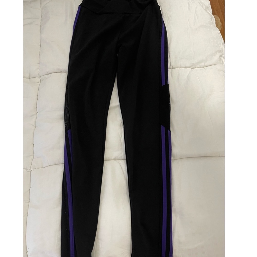 Black leggings pants good wear size small color black and purple strips on sides